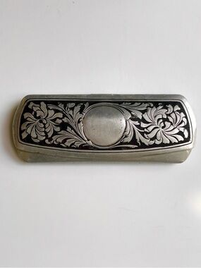 Antique wire-rimmed spectacles with original metal carrying case.